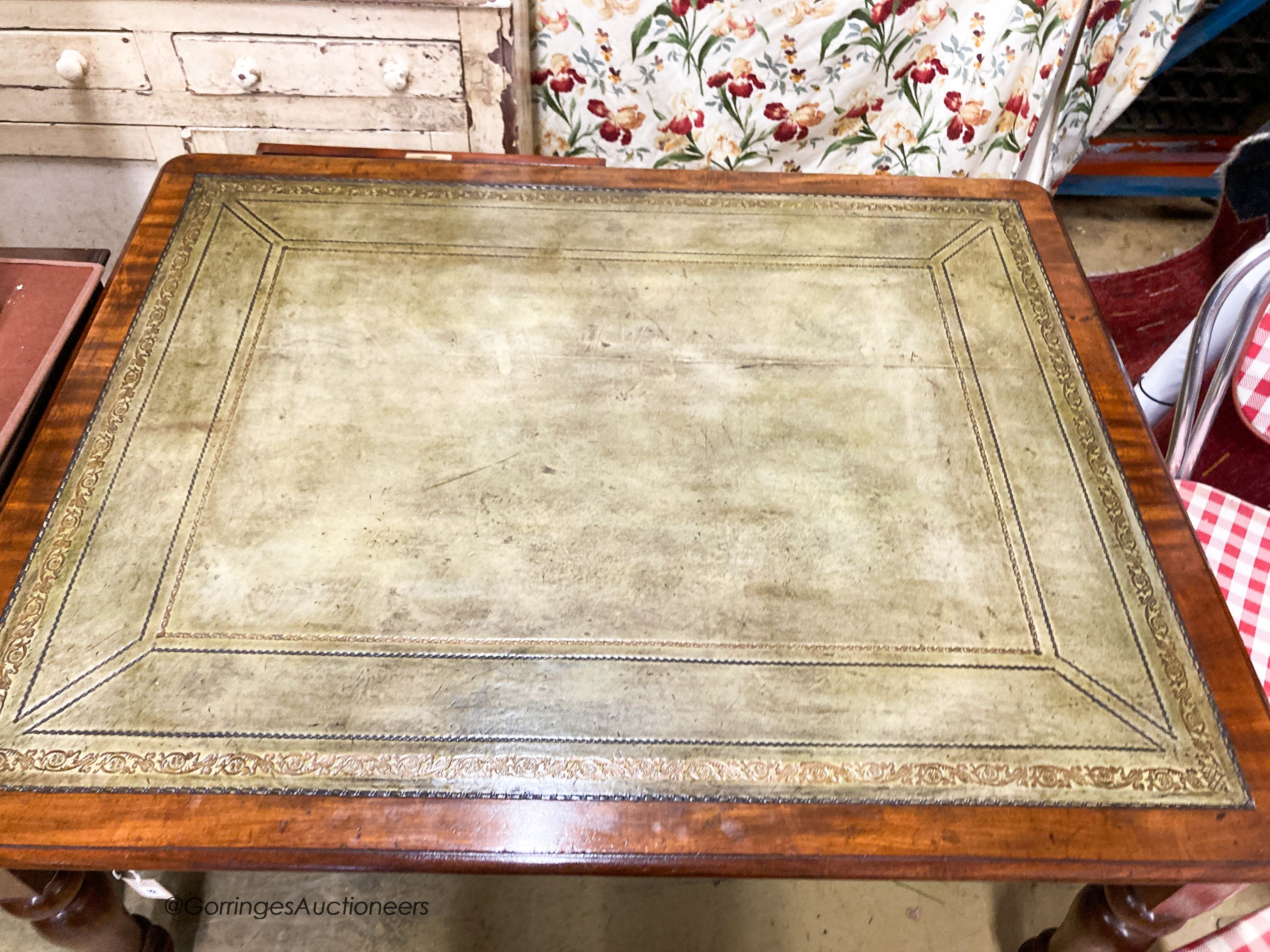 A Victorian mahogany partner's writing table, with green leather inset skiver, W.145cm D.112cm H.76cm